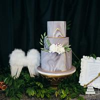 Marble and gold leaf wedding cake (Cupid and Psyche)