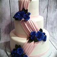pink swag with blue sugar roses