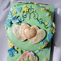 Cake with flower garden and butterflies