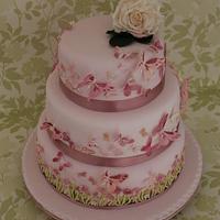 Butterfly wedding cake and cupcakes