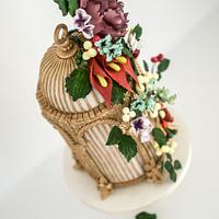 Antique Birdcage with assorted flowers