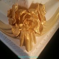 Gold grecian drape wedding cake