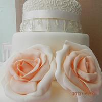 3 tier peach rose wedding cake