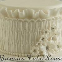 romantic cake with smock fabric and ruffles