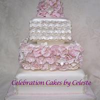 Flowers and pearls wedding cake