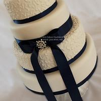 4 Tier Ivory and Navy Blue Wedding Cake