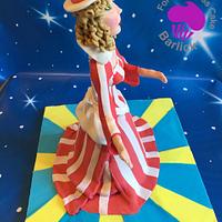 Carni Cleo the Victorian circus lady from the fairground at twilight room in the cake carnival