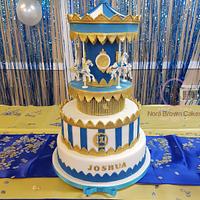 Gold and royal blue carousel cake