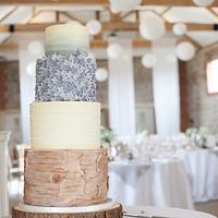 Shades of grey hydrangea and birch log wedding cake