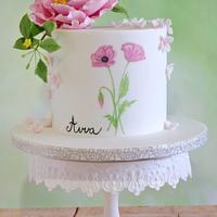Birthday cake with sugar flowers.
