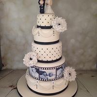 Ivory and black film strip wedding cake 