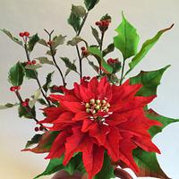 Sugar poinsettia and holly leaves