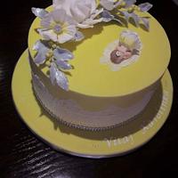 Christening cake in yellow 