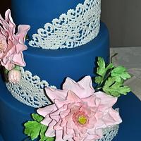 Vintage topaz blue, dahlias and doilies wedding cake