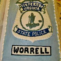 Police badge sheet cake in buttercream