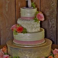 Lace, dots, and rosette BC wedding cake 