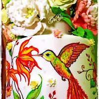 Cake with hummingbirds and flowers