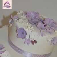 3 tier purple and lilac flowers