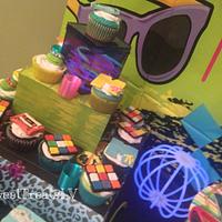 80's themed cake and cupcakes