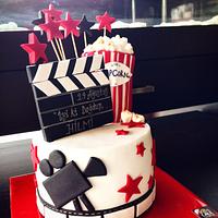 Birthday Cake with popcorn, camera and stars