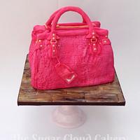 Pink alligator skin handbag 