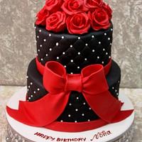 Black cake with red roses