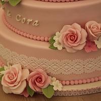 Vintage wedding cake with roses and lace