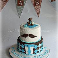 Mustache theme baby shower cake