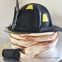 Firemans helmet and hose cake