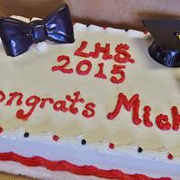 Graduation cake with bowtie and hat