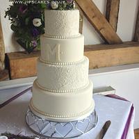Ivory hand-piped cake