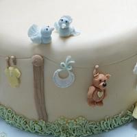 Baby Shower Cake with baby wash day washing line and matching baby basket cupcakes