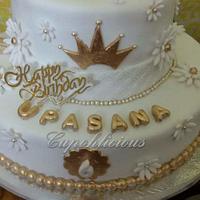 Gold and white cindrella themed chocolate cake 