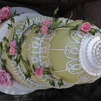 4 Tiered gooseberry green Birdcage wedding cake with pale pink roses