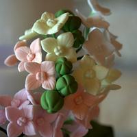 Pastel blooms wedding cake - Mericakes