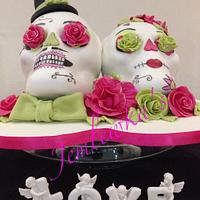 Alternative wedding cake sugar skulls bride and groom