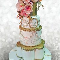 Gold and peach wedding cake 