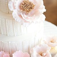 Pearl beaded cake with matching pink ombre cupcaks
