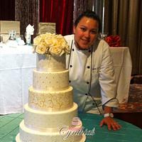 White hand painted wedding cake