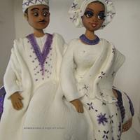 Cake topper - couple in the traditional attire (a touch of white & purple)