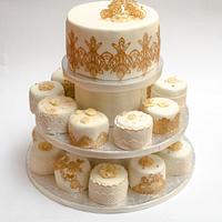 small wedding cakes in champagne and gold