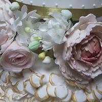 Golden ruffles and flowers wedding cake