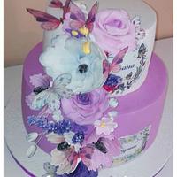 Cake in purple with flowers and butterflies