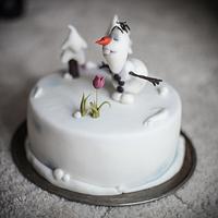Olaf sniffing flower