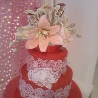 red cake and flowers