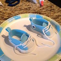 Baby shower cake with tiny Converse