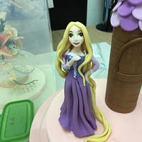 Rapunzel Topper on Strawberry cream cake