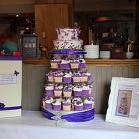 Purple and white butterfly wedding cake