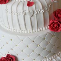 White wedding cake with personalised topper