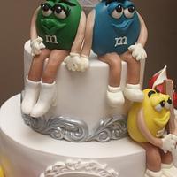 M&M Wedding Cake  all edible with bridal party professions